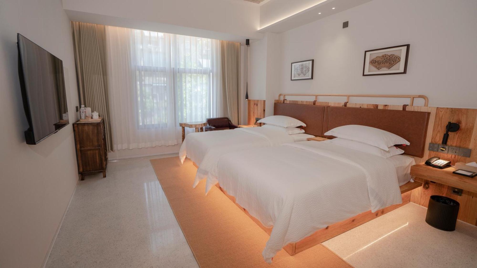 Patio Spring Holiday Inn -- Free Round Trip Pick-Up Service --Panoramic View Of Tianmen Mount Zhangjiajie Eksteriør bilde