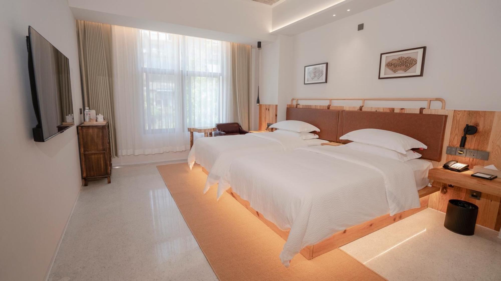 Patio Spring Holiday Inn -- Free Round Trip Pick-Up Service --Panoramic View Of Tianmen Mount Zhangjiajie Eksteriør bilde